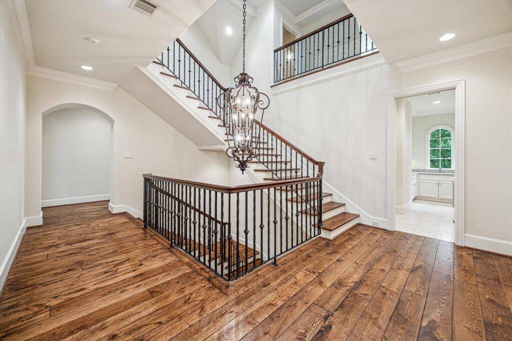 Upstairs features your secluded bedrooms, all with en suite baths, as well as a generous laundry room and a large flex room.