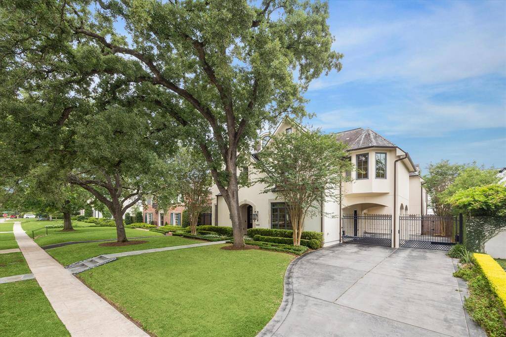 This lovely home is walking distance to schools, and features an oversized driveway and garage and 5 big, beautiful bedrooms as well as 2 flex rooms, beautiful formals and a paneled study and bar.