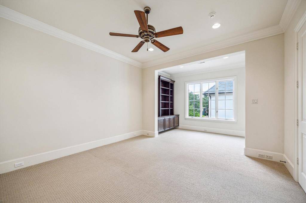 Generous game rom overlooks the gated motor court.