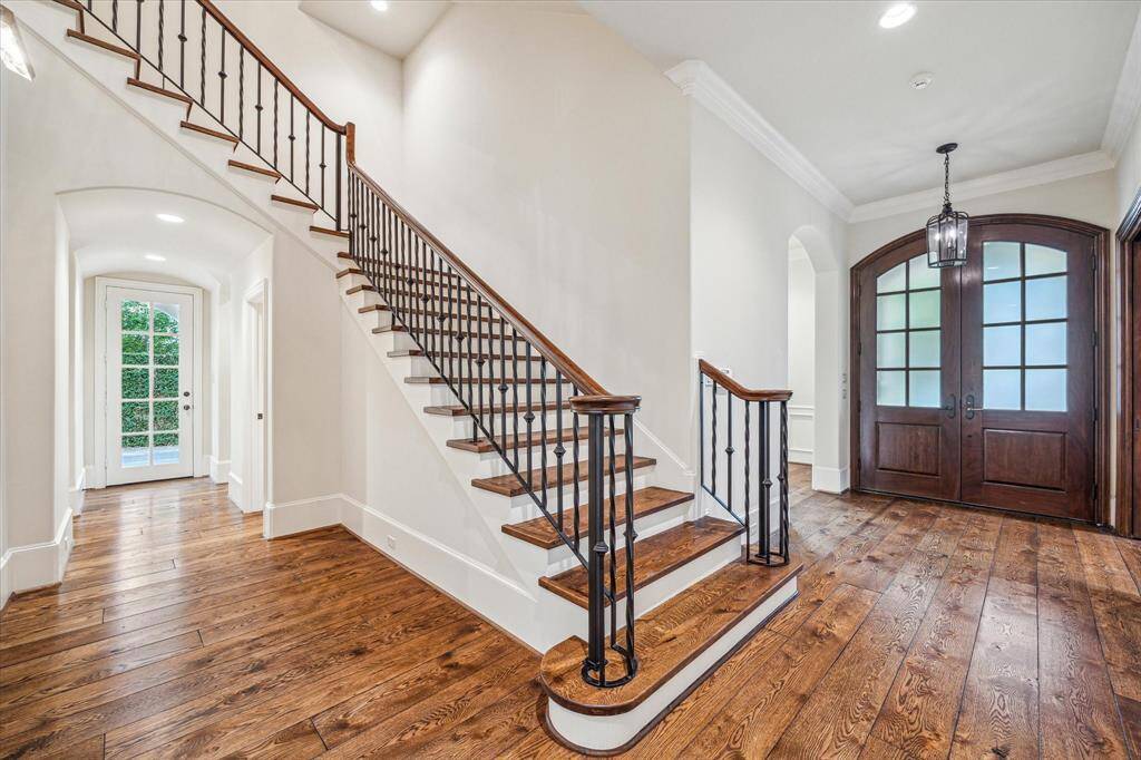 Gleaming hardwoods and beautiful finishes abound in this wonderful home.