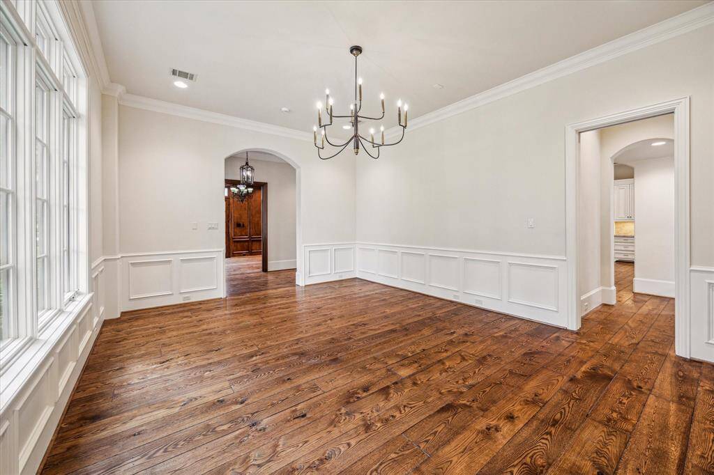 The formal dining room overlooks the beautiful tree lined street.