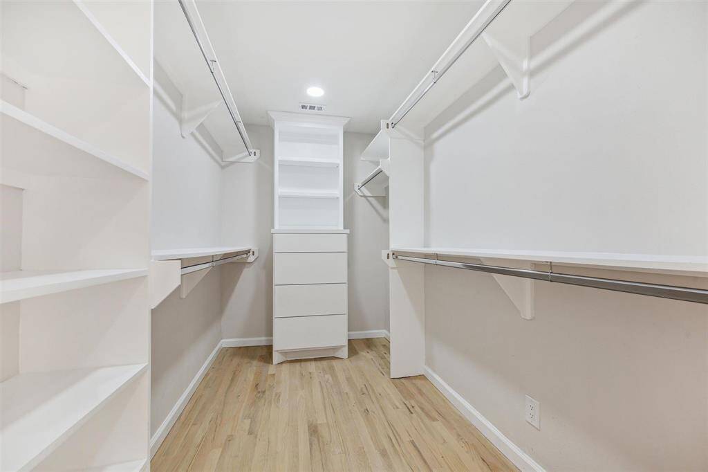 Spacious walk in closet in primary bedroom was added in 2024