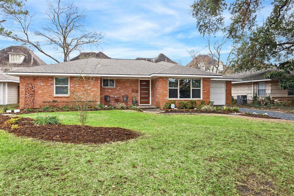 Another view of this beautifully maintained home featuring a classic brick exterior that offers timeless curb appeal and low maintenance durability