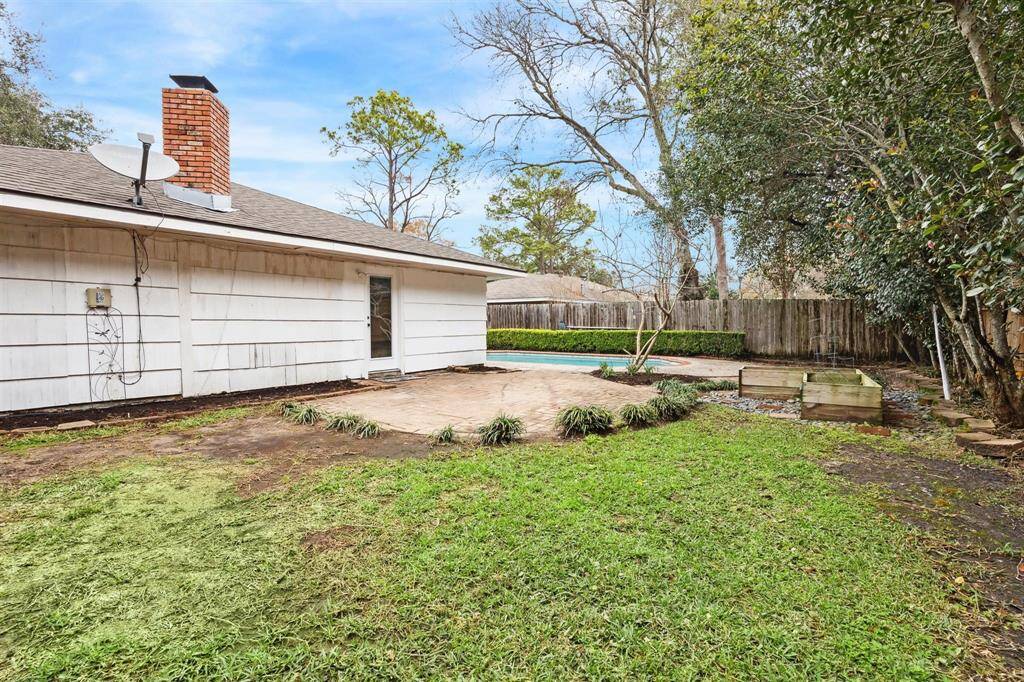 Lots of yard space in addition to the pool.