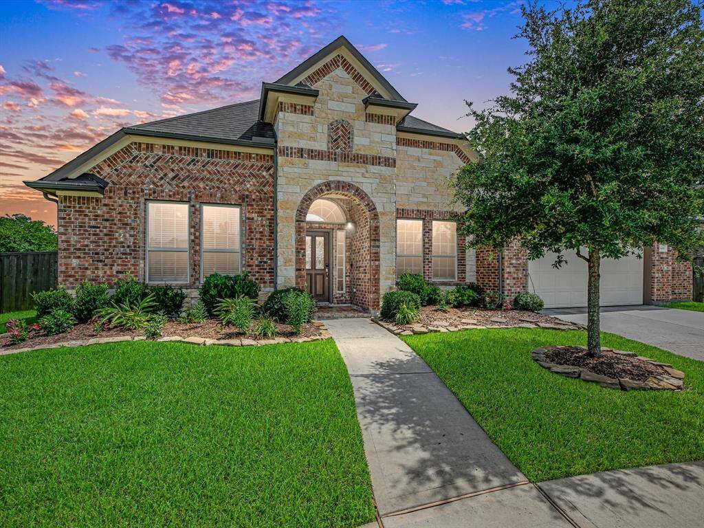 Stunning exterior with a beautifully designed elevation and lush, well-maintained greenery.