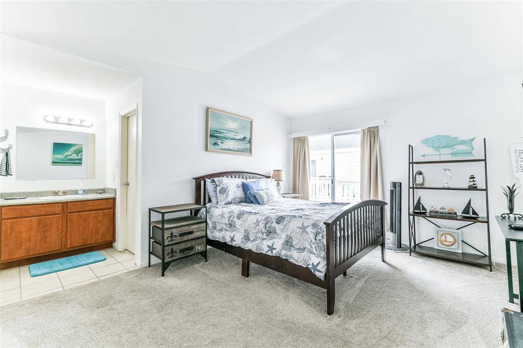 Large bedroom with a huge walk-in closet.