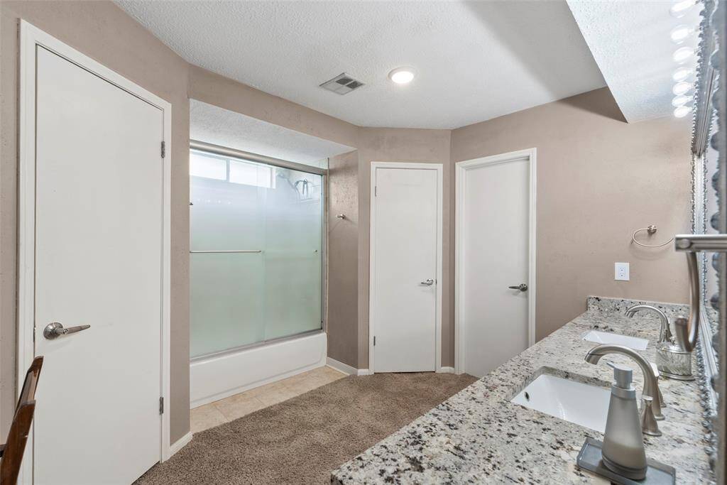 Primary Bath offers Double Sinks*Granite Countertops*Upgraded Fixtures