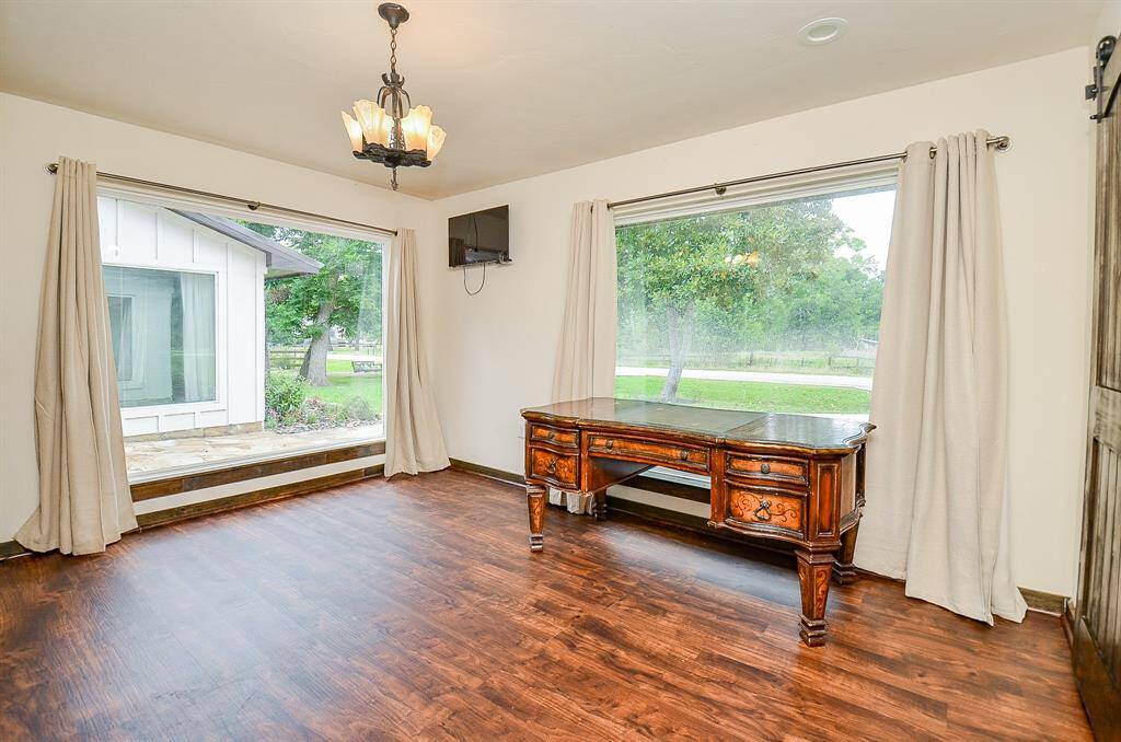 Bedroom one with gorgeous floor to ceiling windows