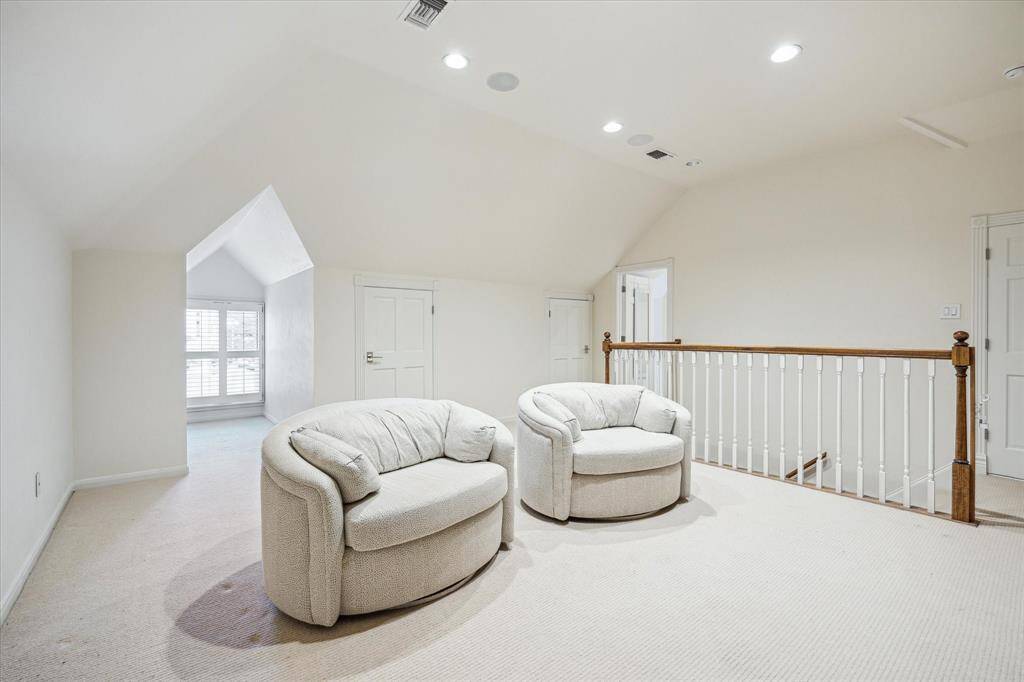 The third floor GAMEROOM (19 X 17) is a great flex room for media/exercise/playroom with its carpeted flooring, dormer window with plantation shutters, staircase with wood railing, ceiling speakers, recessed lighting, 2 storage closets, attic access.  A fourth bedroom is also situated on the 3rd floor which allows the floor with the option of being quarters or apartment for guests!