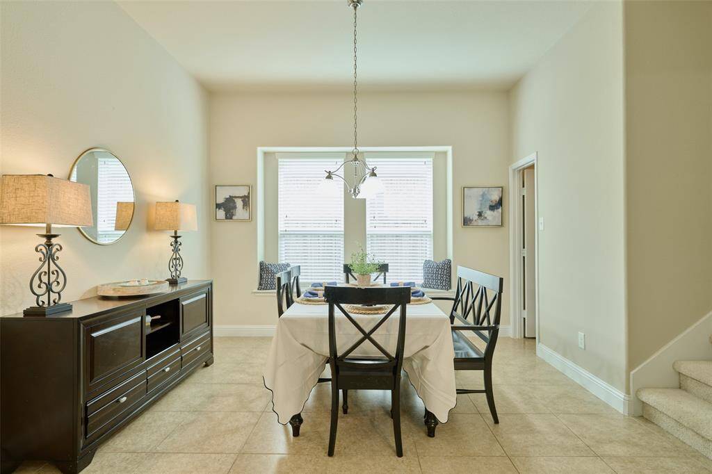Dining area looking into the kitchen and family room.