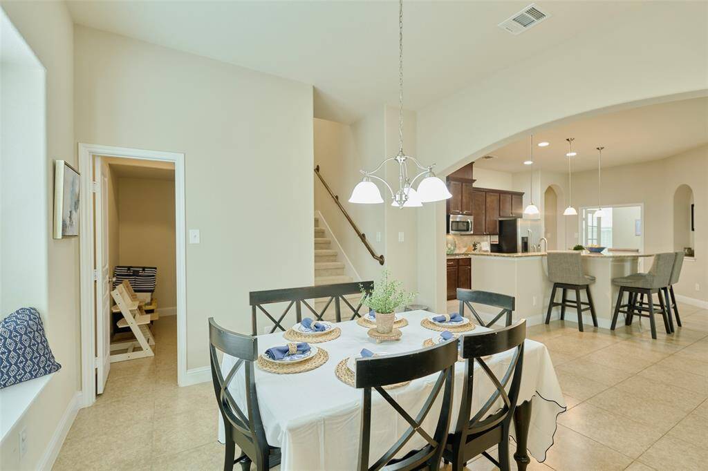 This home features neutral finishes throughout and easy to maintain tile floors.