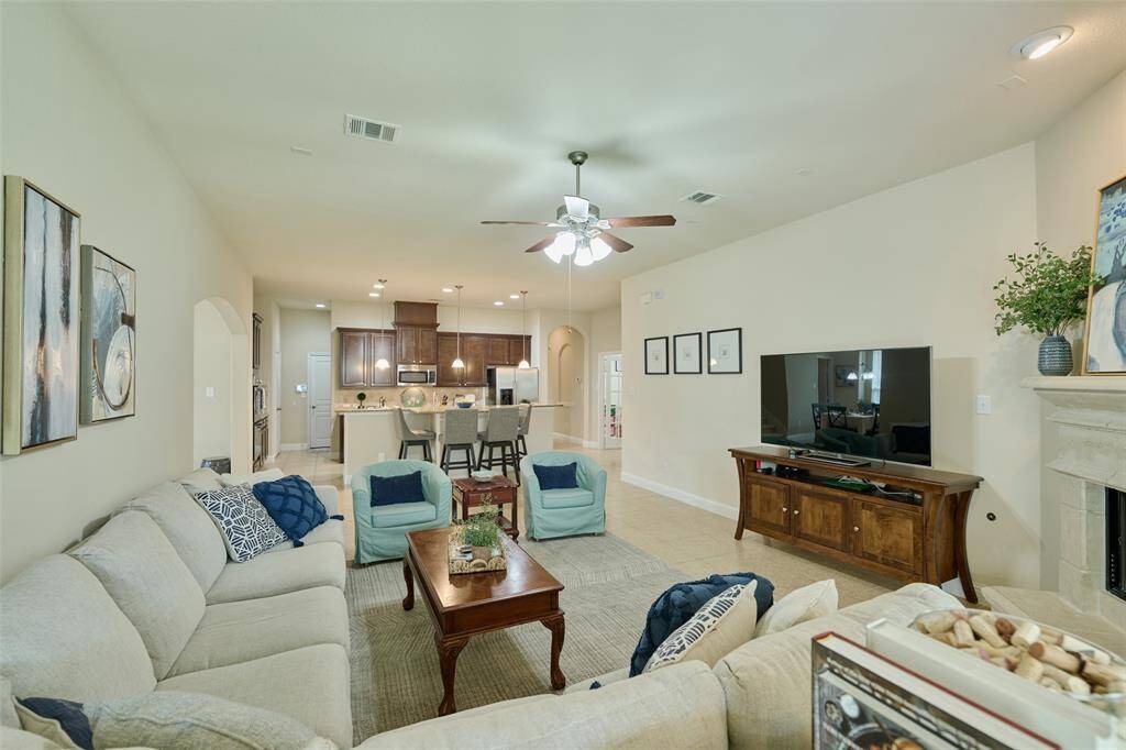 Spa like primary bath featuring his and her vanities, large soaking tub and separate shower
