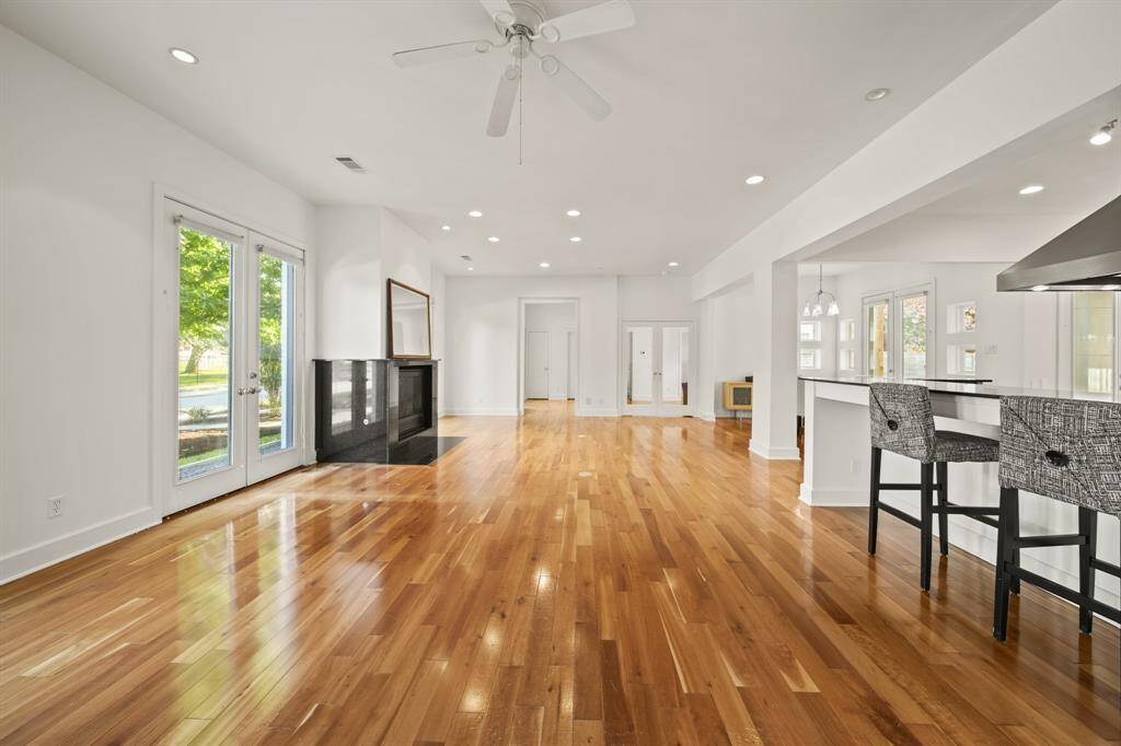 Gas log fireplace in the living room and French doors to enter the home via first floor. Look at all the natural light!