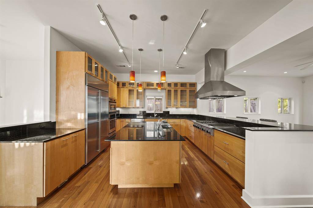Chef's dream kitchen with GE Professional Appliances and custom cabinetry. Built in refrigerator included.