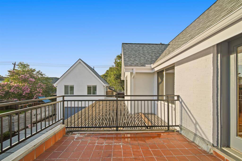 Second floor balcony, French door access from game room. Perfect to watch Houston's changing skies.