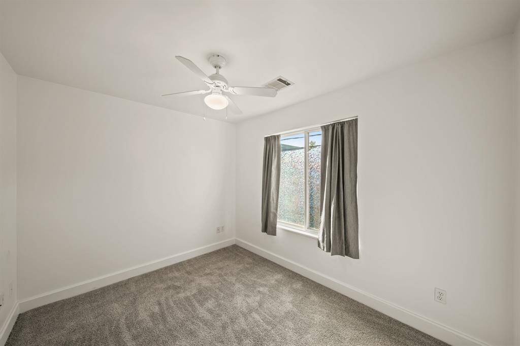 Bedroom in guest quarters. New carpet and new paint.