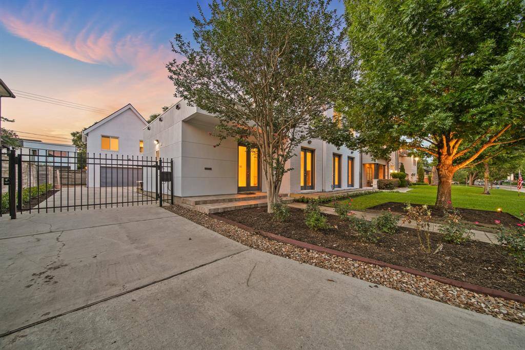 The home has beautiful curb appeal with fresh landscaping.