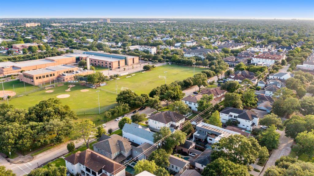 Aerial view of home and neighborhood.