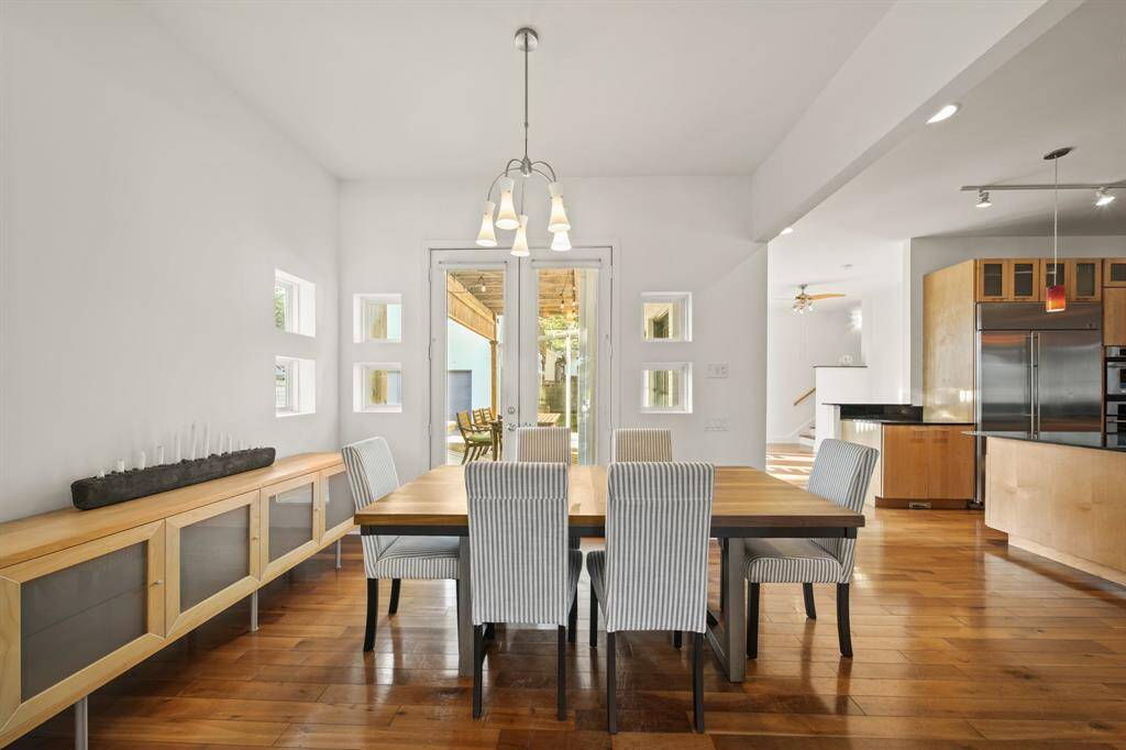 Elegant dining room opens to family room with easy access to kitchen, perfect for hosting!