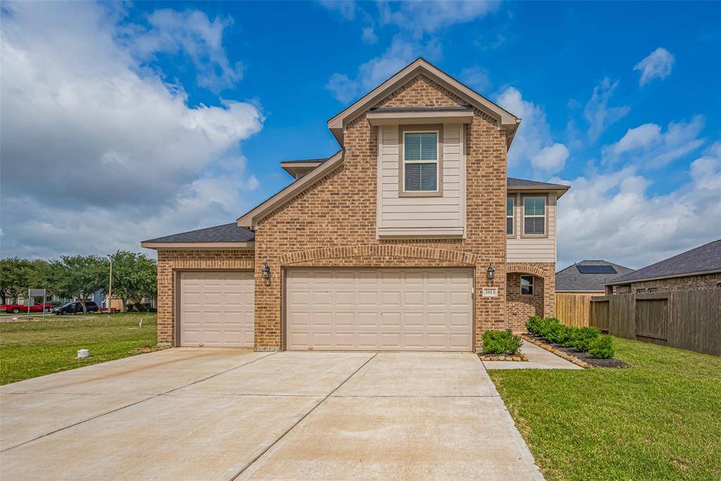 Classic brickwork and a recessed entryway offer timeless curb appeal, while the home’s cul-de-sac position adds privacy and charm.