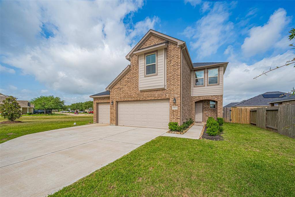 A more intimate view of the front reveals the thoughtful landscaping and clear path leading to the entrance.