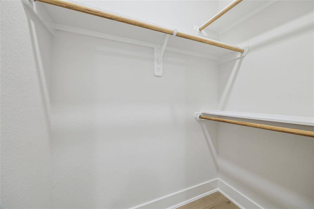 Spacious dual primary closets for ample storage and organization.