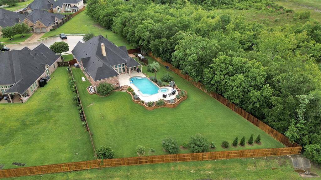 Welcome to 4003 N Creekmont! Such a unique property with a backyard oasis!