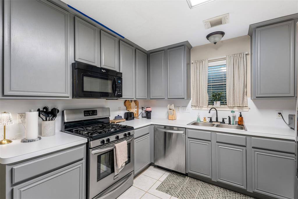Big kitchen with stainless steel appliances