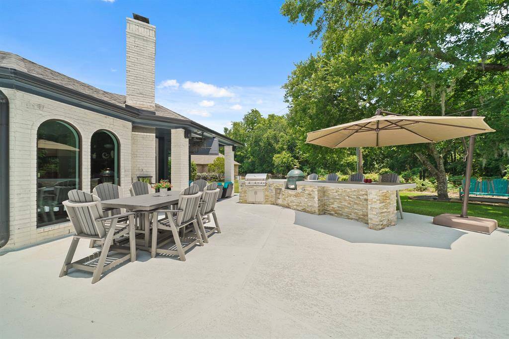 The Backyard is designed for entertaining with so many places to sit and socialize. This portion of the Back Patio is ideal for Outdoor Dining or outdoor games like cornhole.