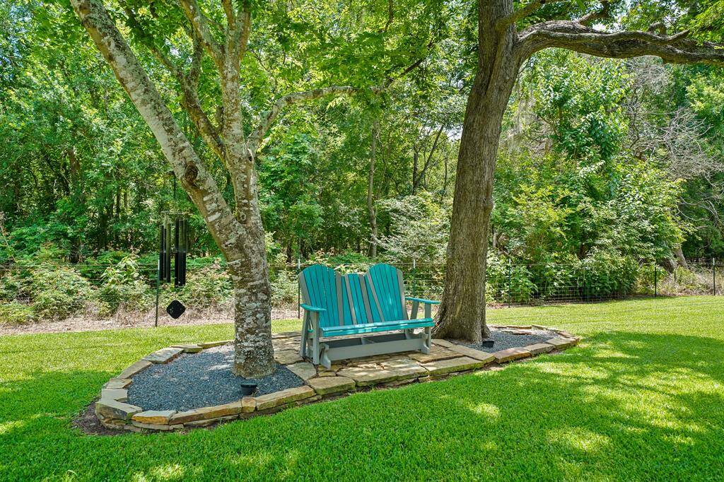 Enjoy your morning coffee cradled between two large live oak trees while listening to the sounds of the birds and the tranquil trickling from the Pool’s waterfall feature.