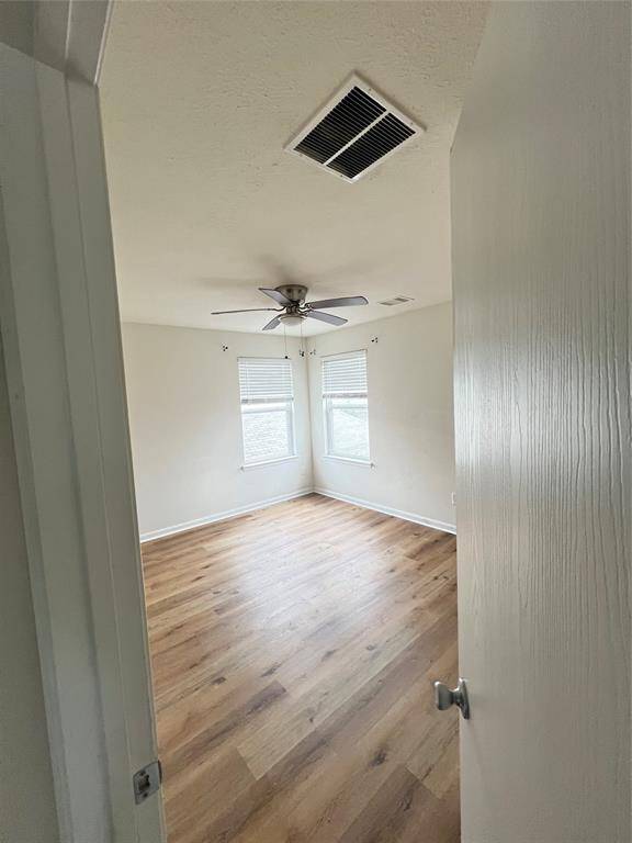 Another secondary bedroom with lots of natural light.