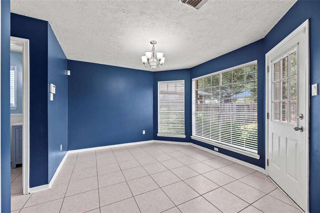 Breakfast room. Lots of windows add natural light in the morning.