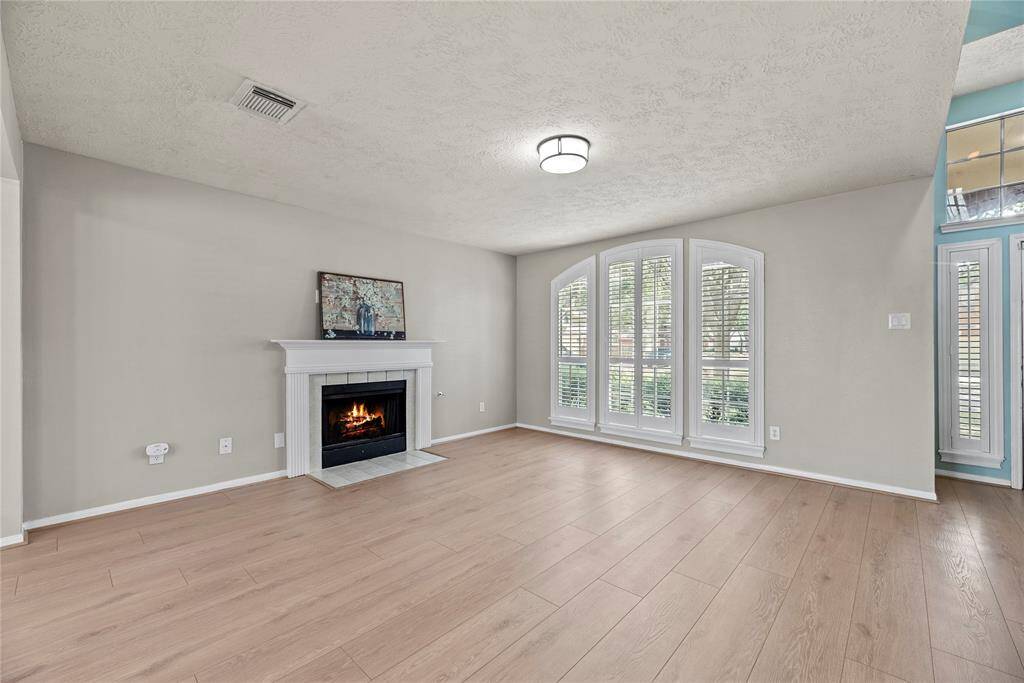 Beautiful plantation shutters on the front windows in the living room.