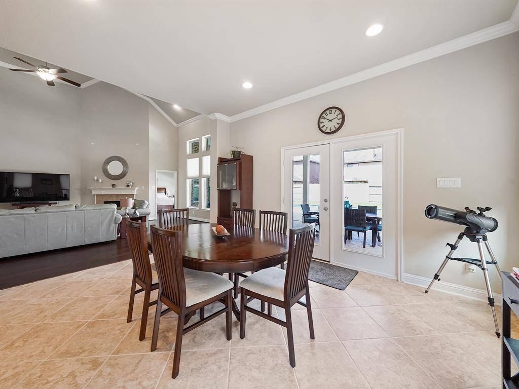 The breakfast area has french door access to the backyard. Plenty of space to accommodate a large table set for 6 or more.