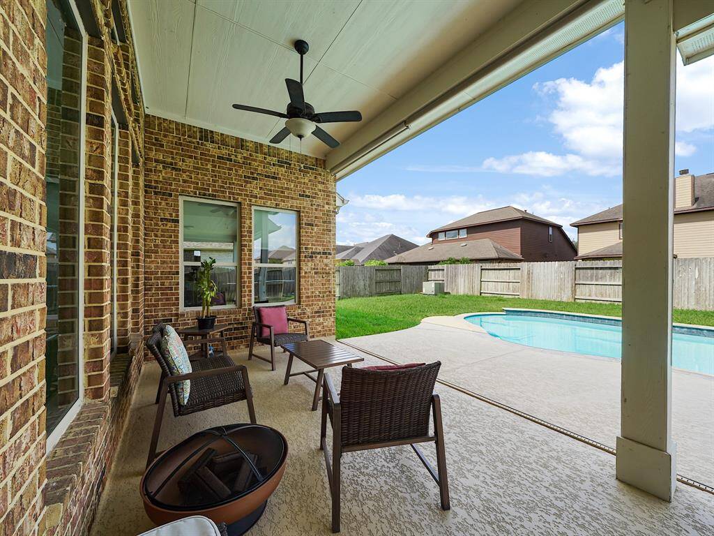 Even with a pool and covered patio there is still green space for other outdoor activities or a four-legged friend to run.