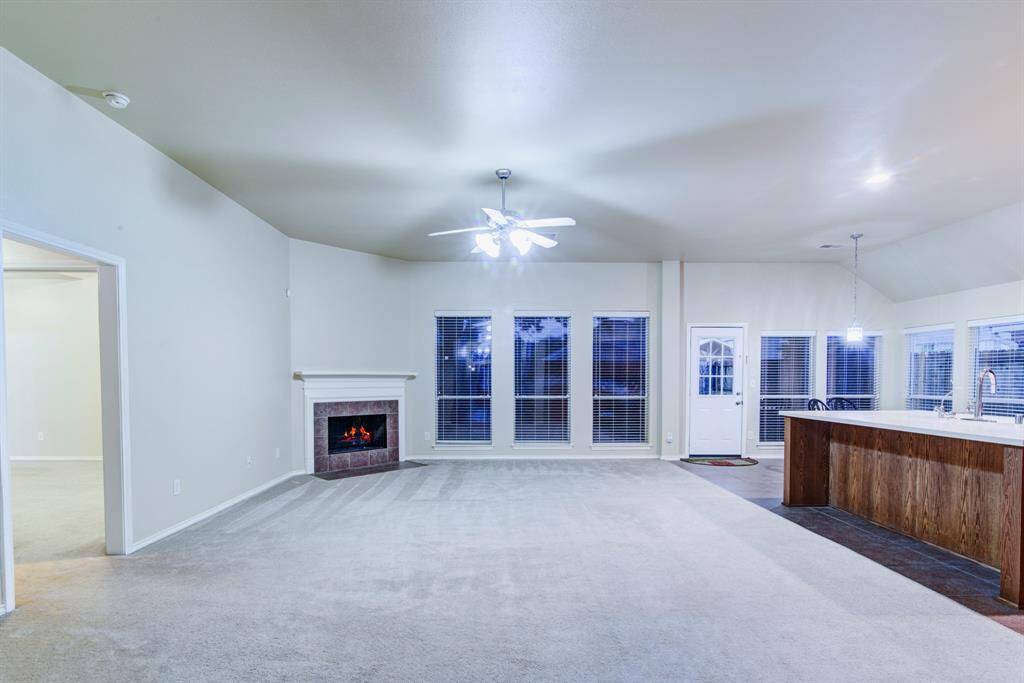 The open doorway to the left leads into the primary suite