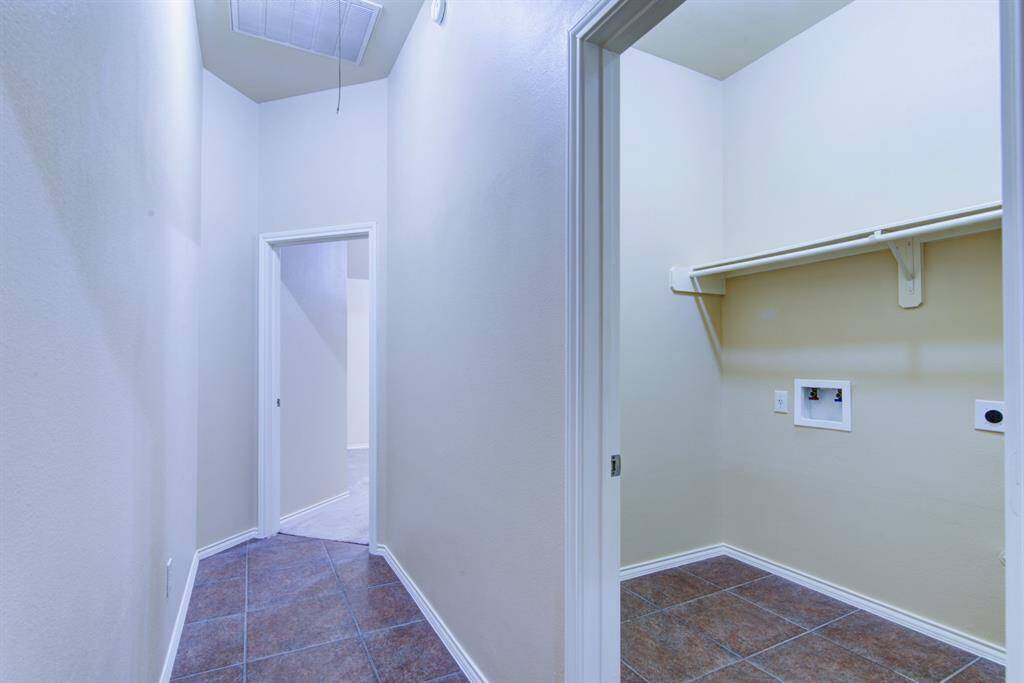Just across from the study is an independent hallway and guest suite just down from the centrally located laundry room.