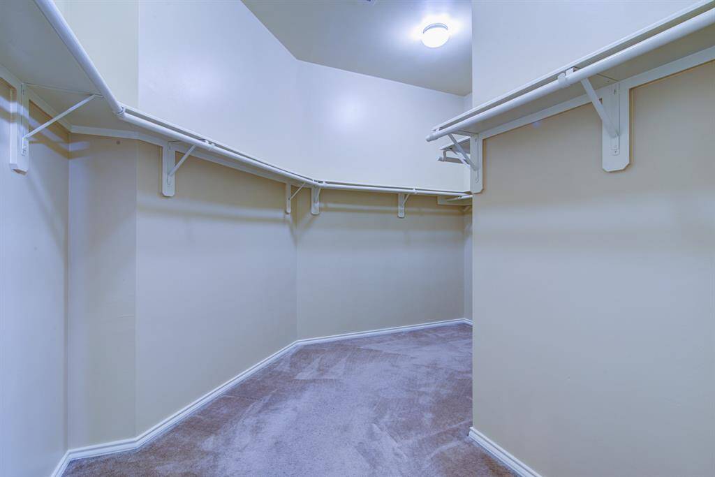 To the left of the closet