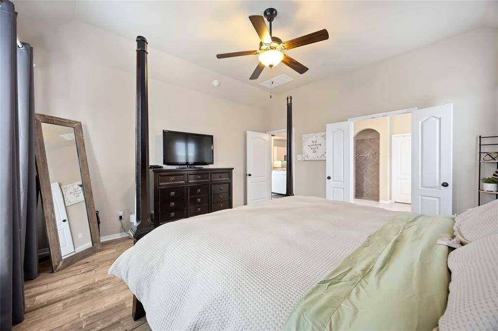 Enjoy comfort and privacy in the primary bedroom, complete with an ensuite bathroom offering a spacious walk-in closet.