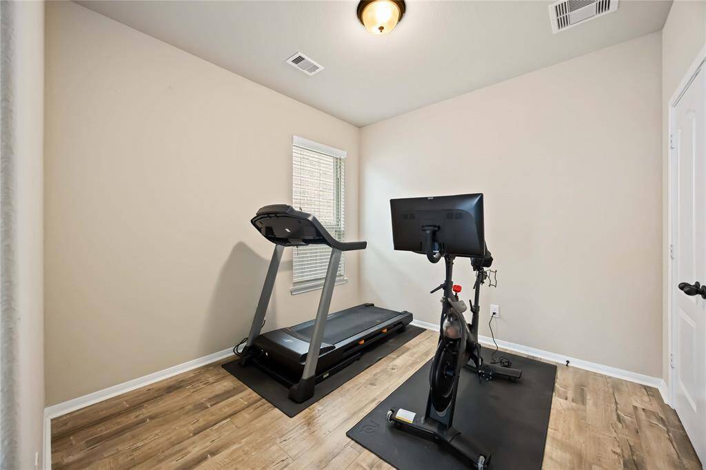 This versatile flex room can be used as a home office, guest area, or a workout space. You choose!