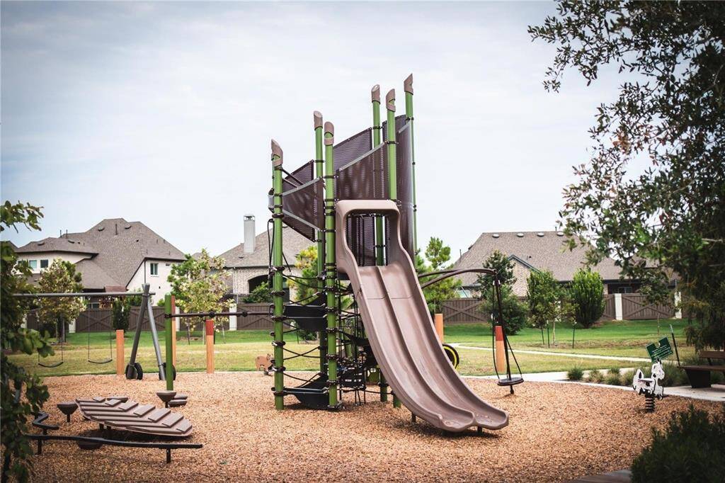 A vibrant neighborhood in Harvest Green with family-friendly amenities including playgrounds, picnic areas, and open spaces ideal for gatherings and outdoor fun.