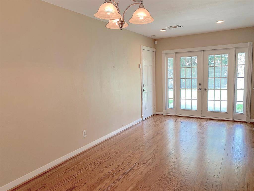 French doors leading to covered back patio.