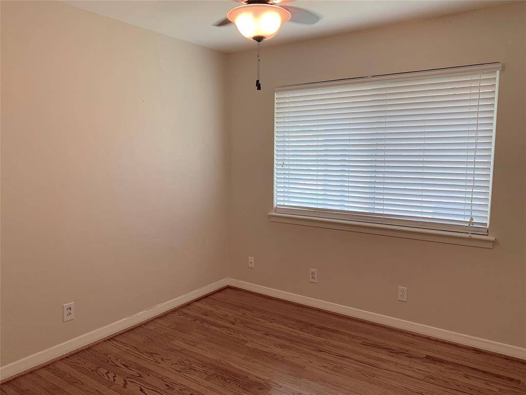 View of 3rd bedroom. Neutral paint colors.