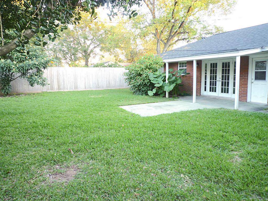 French doors and covered back patio.