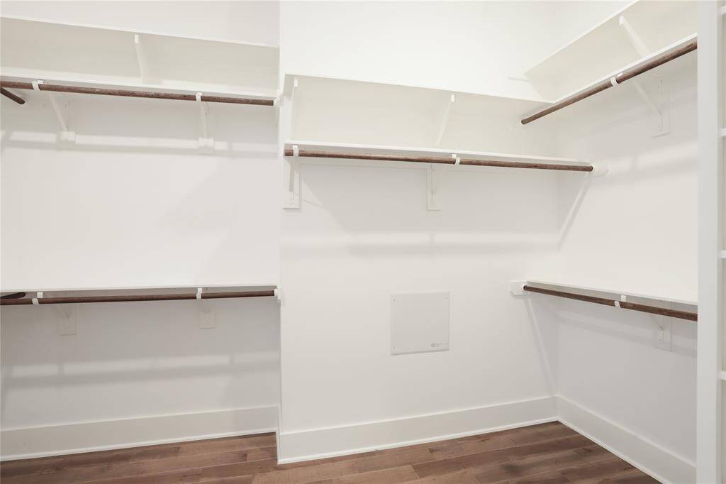 The primary closet that actually has room for ALL your belongings. Endless space in here.