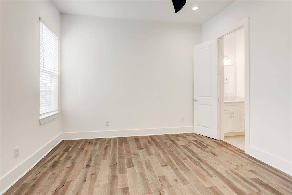 Another angle of this secondary upstairs bedroom, perfect for guests.