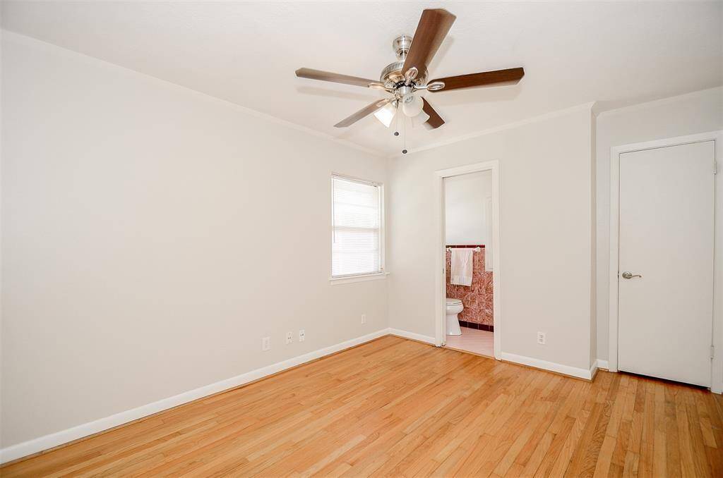 Another view of primary bedroom