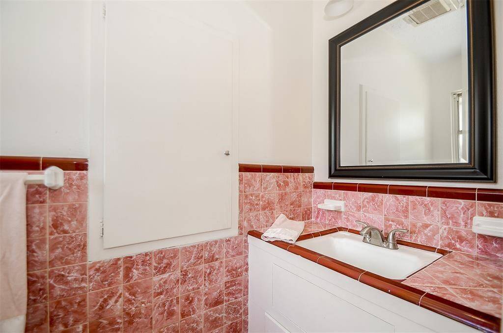Half bathroom in primary bedroom