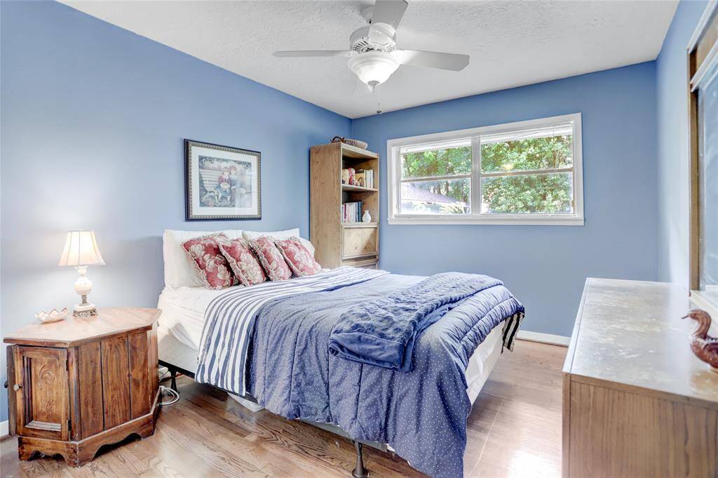 Another secondary bedroom overlooks the backyard with a generous closet for storage.