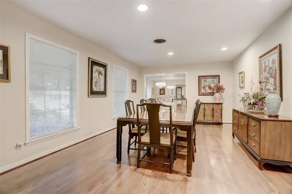 The original formal dining room with hardwood floors and recessed lighting is being used for banquet capable dining room.